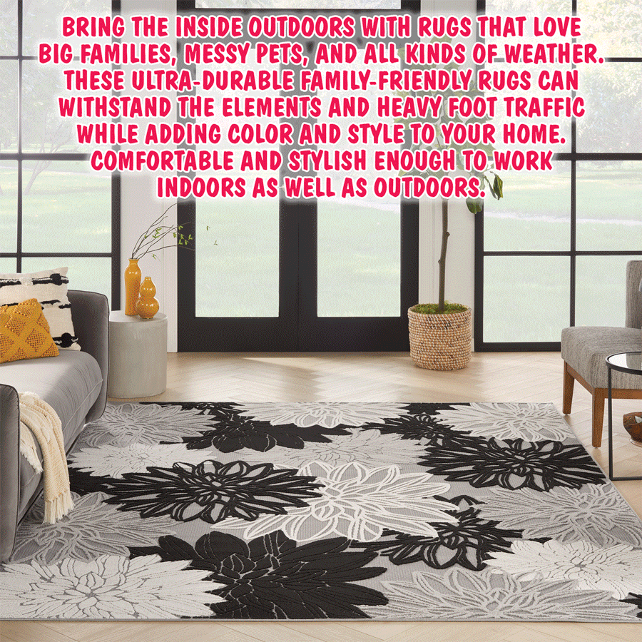 Nourison Dahlia Bouquet and Veranda Indoor Outdoor Patio Rugs 7 feet 9 inches by 9 feet 10 inches $119. Dahlia Bouquet blue grey item numbers OG79910BLGRY, natural item numbers OG79910NATRL, and multicolored item numbers OG79910MTC. Veranda black grey item numbers VNA79910BLKGR and orange yellow item numbers VNA79910ORGYL. Styles, colors, and sizes may vary by store.